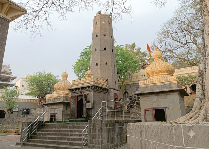 Temple precinct beside the river at sunset